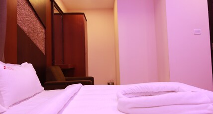 Apple Suites - Gandhi Nagar Room Type - FOUR BED AC