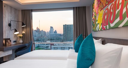 Maitria Hotel Rama 9 - A Chatrium Collection Room Type - Grand Deluxe City View King Bed