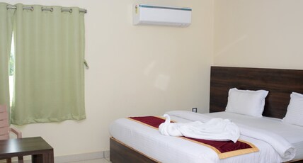 Nandini residency Room Type - Deluxe One King and One Single Bed