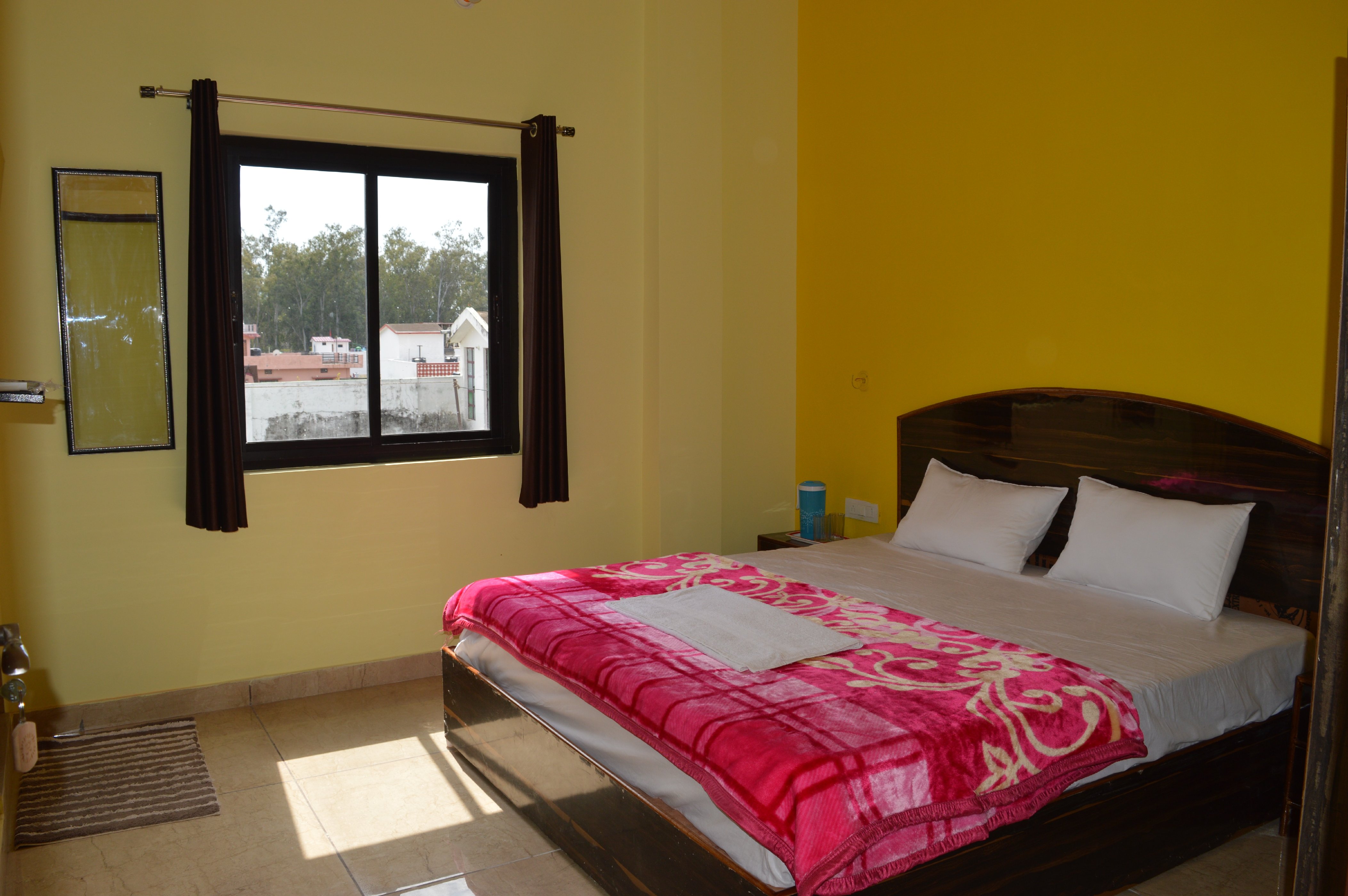 Hotel Yog Nagri - Tap to explore photos