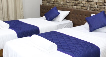 Olivia Inn And Suites Room Type - Deluxe Twin - AC Room