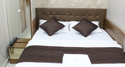 Olivia Inn And Suites Room Type - Deluxe Room Non AC