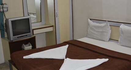 Hotel Midtown Room Type - Standard Room (Non-AC) Hotel Midtown Room Type - Standard Room (Non-AC)