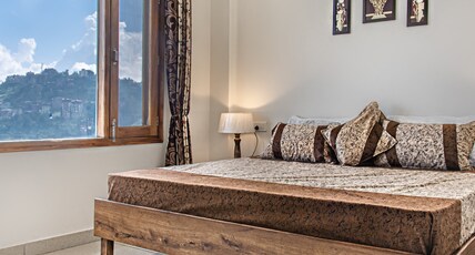 Hills View Paradise | Rooms & Kitchen Room Type - 2 Mountain-view Deluxe Room with 1 Private Washroom Hills View Paradise | Rooms & Kitchen Room Type - 2 Mountain-view Deluxe Room with 1 Private Washroom