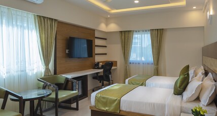 Vanusa Residency Room Type - Club Twin Room