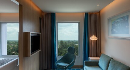 Holiday Inn Express & Suites, OMR Bengaluru Room Type - 1 Queen Bed Junior Suite & Free Breakfast Holiday Inn Express & Suites, OMR Bengaluru Room Type - 1 Queen Bed Junior Suite & Free Breakfast