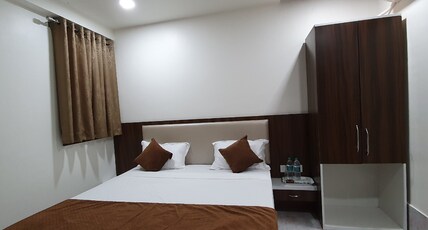Pushpak Hotel Room Type - Deluxe AC room