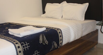 Tanvi Guest House Room Type - Deluxe Room
