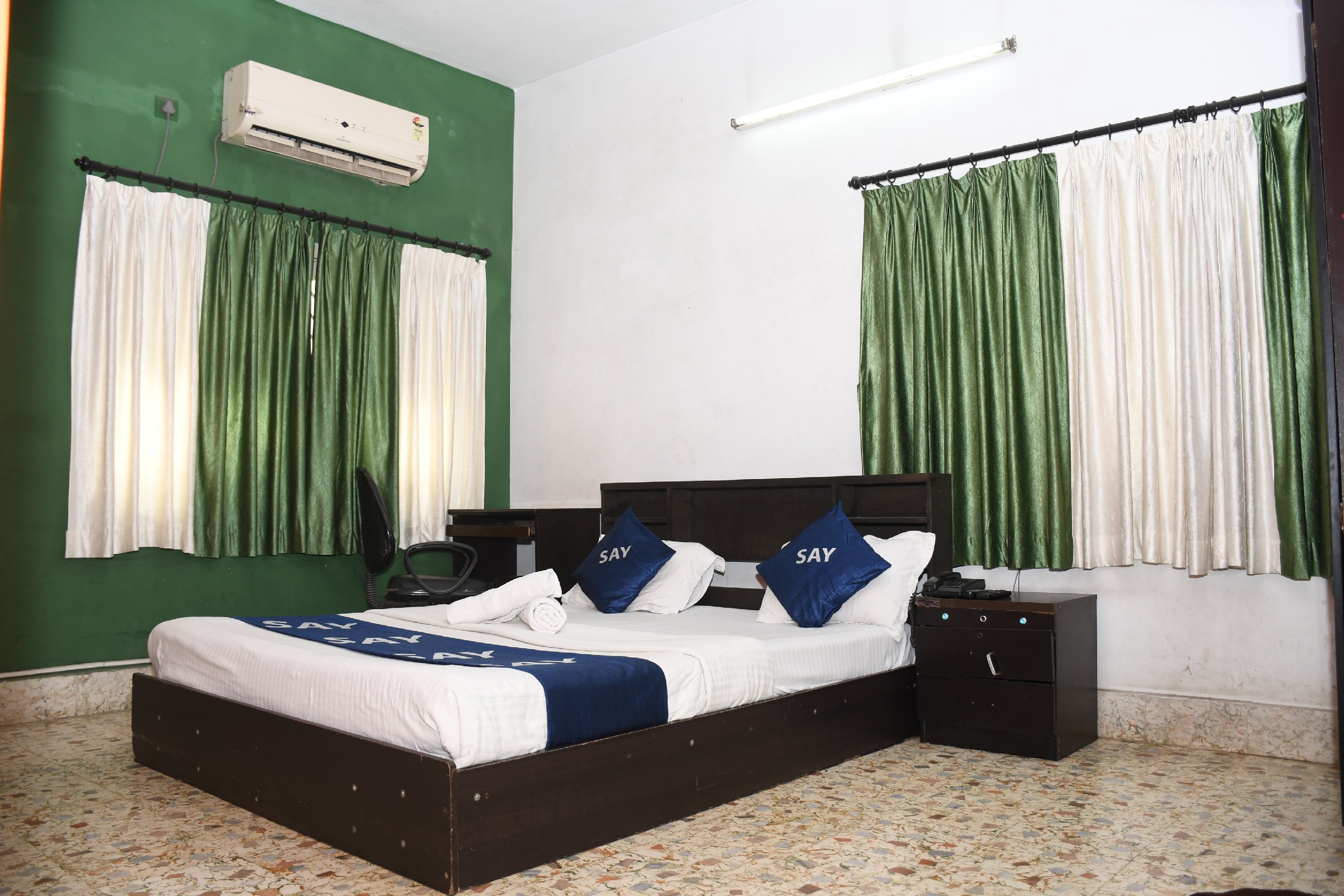 Say Rooms Trip Manager Guest House - Tap to explore photos