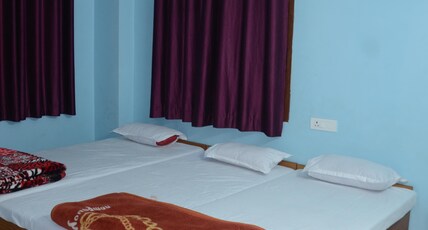 Matri hotel and banquets Room Type - Deluxe room