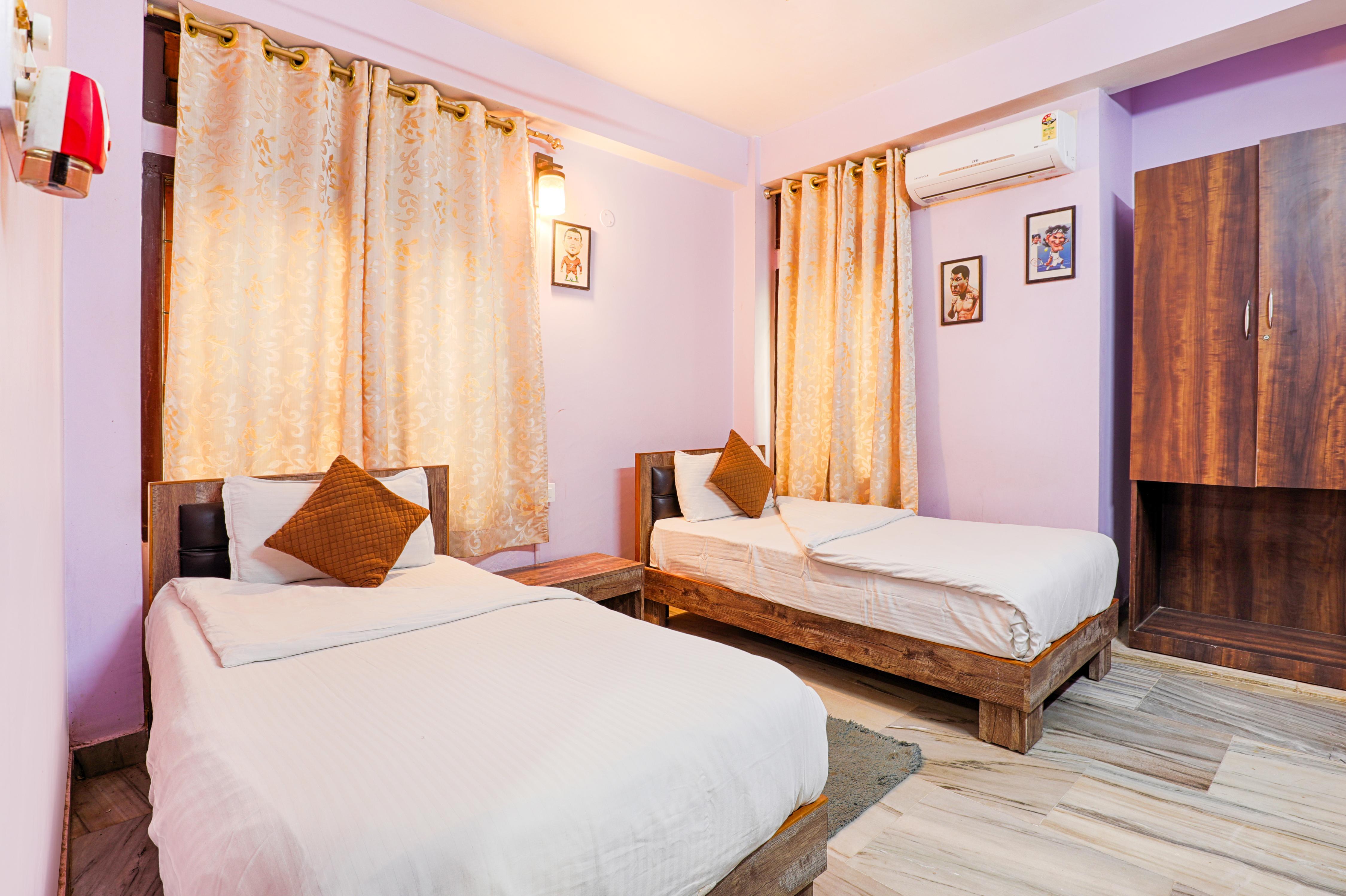 GrassRoot Residency in Guwahati Room Type - Twin Bedroom