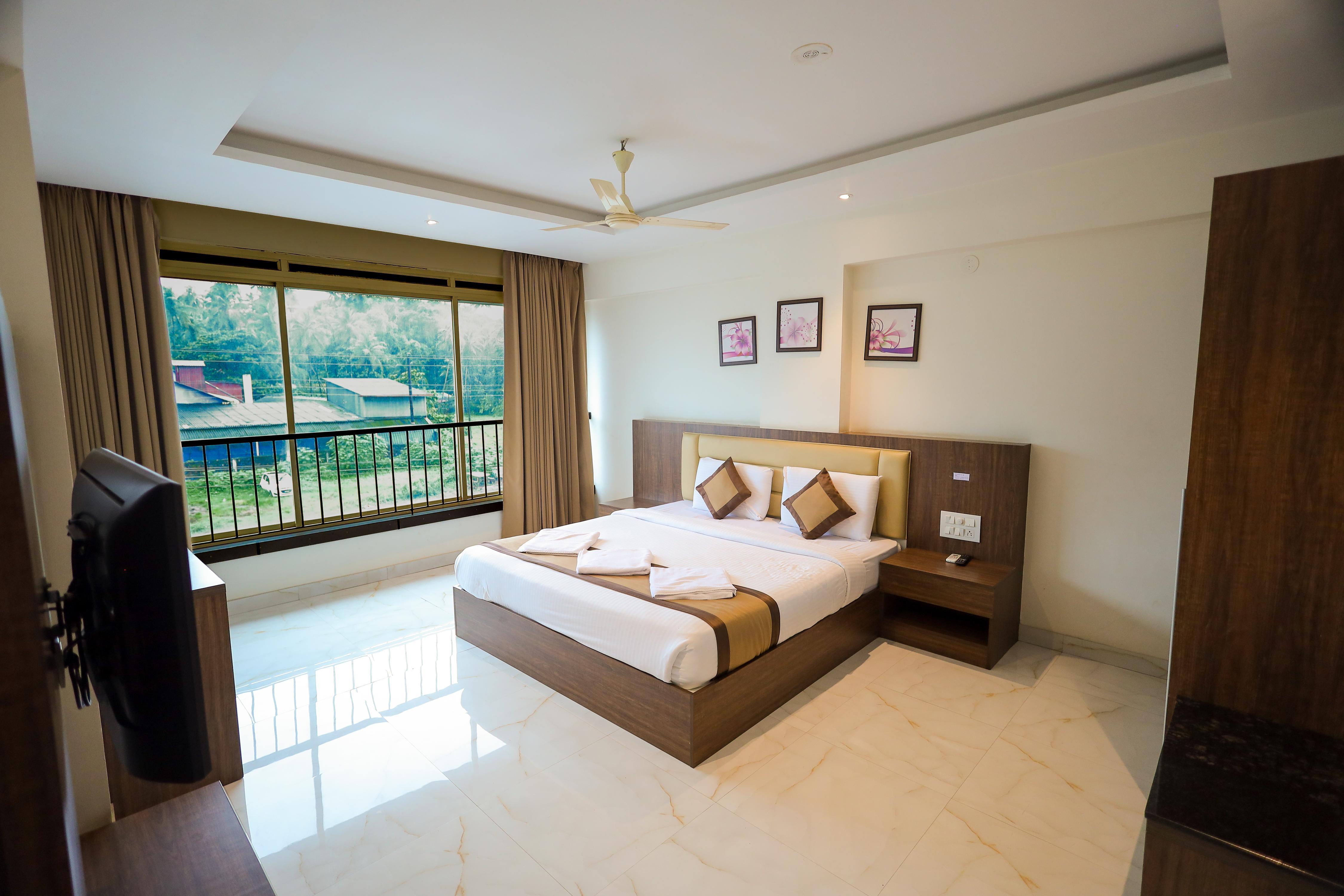 Adyar Plaza Inn by RAK Rooms, Mangaluru - Tap to explore photos