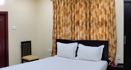 Temple Stay - Uma Residency & Guest House Room Type - Premium Double Non AC