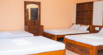 Panchamukhi Green Palace - Managed by Universal Green Commerce Room Type - Eight Bed(4 nos Double Bed)