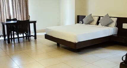 Pratham Inn by DOWNTOWN HOTEL Room Type - Deluxe Room AC