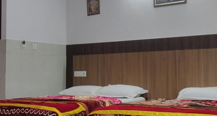 Shree Poorna Lodge Sringeri Room Type - Deluxe 4 Beded AC Room
