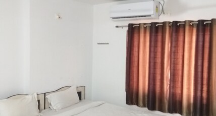 HOTEL RAJESHWARI Room Type - Deluxe Room