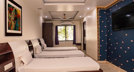 Hotel Raj & Restaurant Room Type - Triple Bed AC Room Hotel Raj & Restaurant Room Type - Triple Bed AC Room