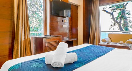 Hotel Aashna by Savitri Sons Room Type - Deluxe Room with Mountain View