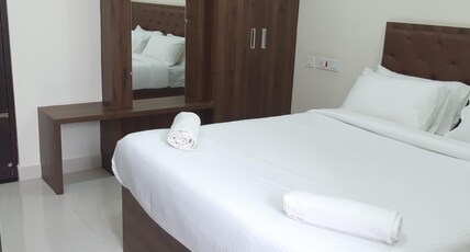 CNR RESIDENCY Room Type - Deluxe Double or Twin AC Room