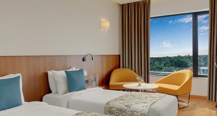 The Fern Residency Jamnagar, Series by Marriott Room Type - Winter Green, Guest room, 2 Twin, City view The Fern Residency Jamnagar, Series by Marriott Room Type - Winter Green, Guest room, 2 Twin, City view