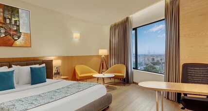 The Fern Residency Jamnagar, Series by Marriott Room Type - Hazel, Suite, 1 King, Courtyard view The Fern Residency Jamnagar, Series by Marriott Room Type - Hazel, Suite, 1 King, Courtyard view