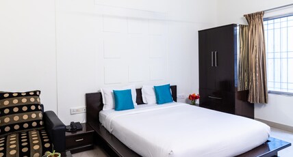 Sanctum Suites Domlur Bangalore Room Type - Deluxe Queen Room