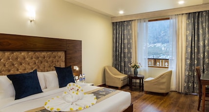 Ashapuri Village Resort & Banquet Room Type - Rani Suite (Mountain View with Balcony) Ashapuri Village Resort & Banquet Room Type - Rani Suite (Mountain View with Balcony)
