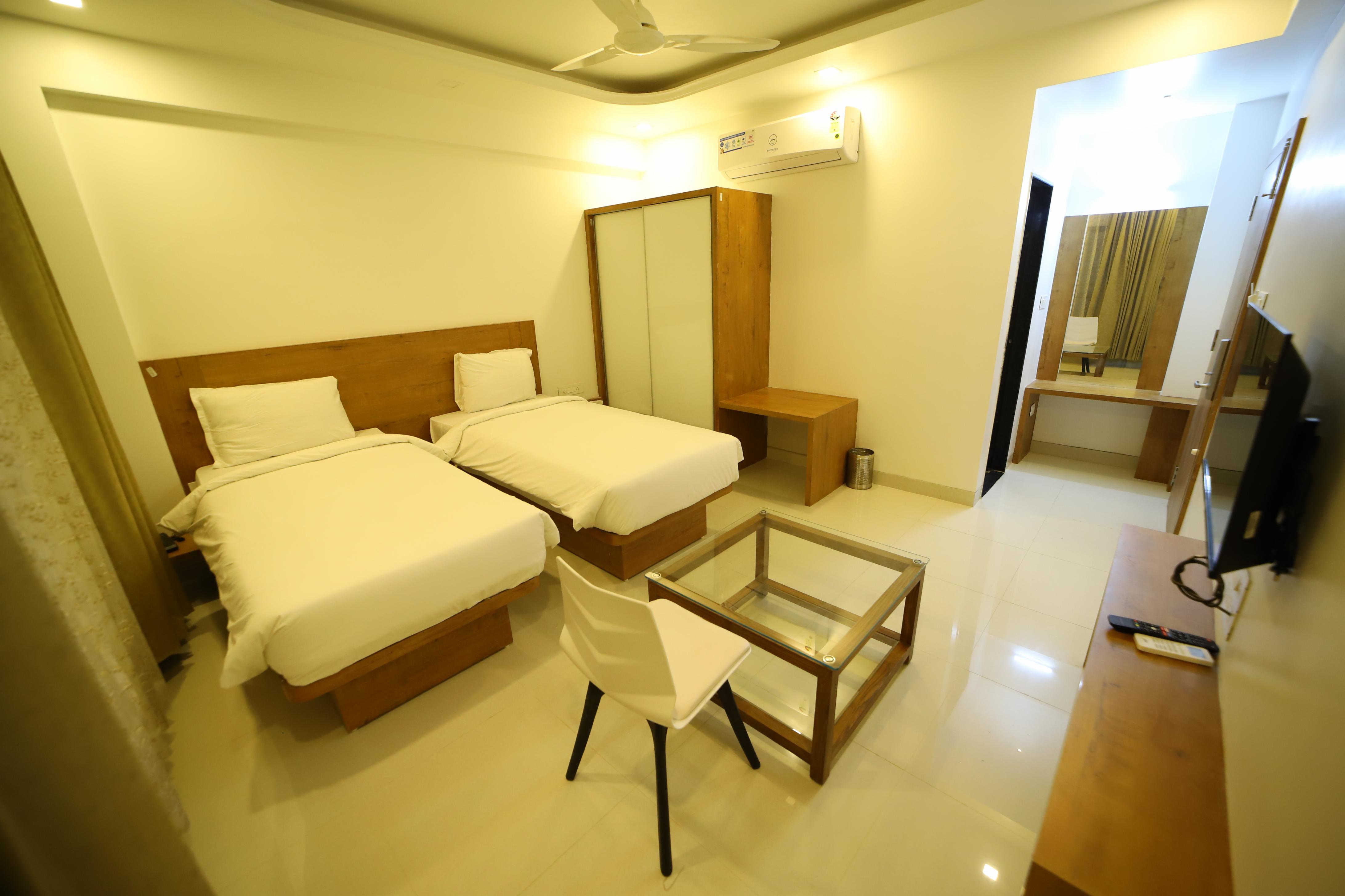 Hotel The Orange Flag - Renuka Enterprises - Tap to explore photos