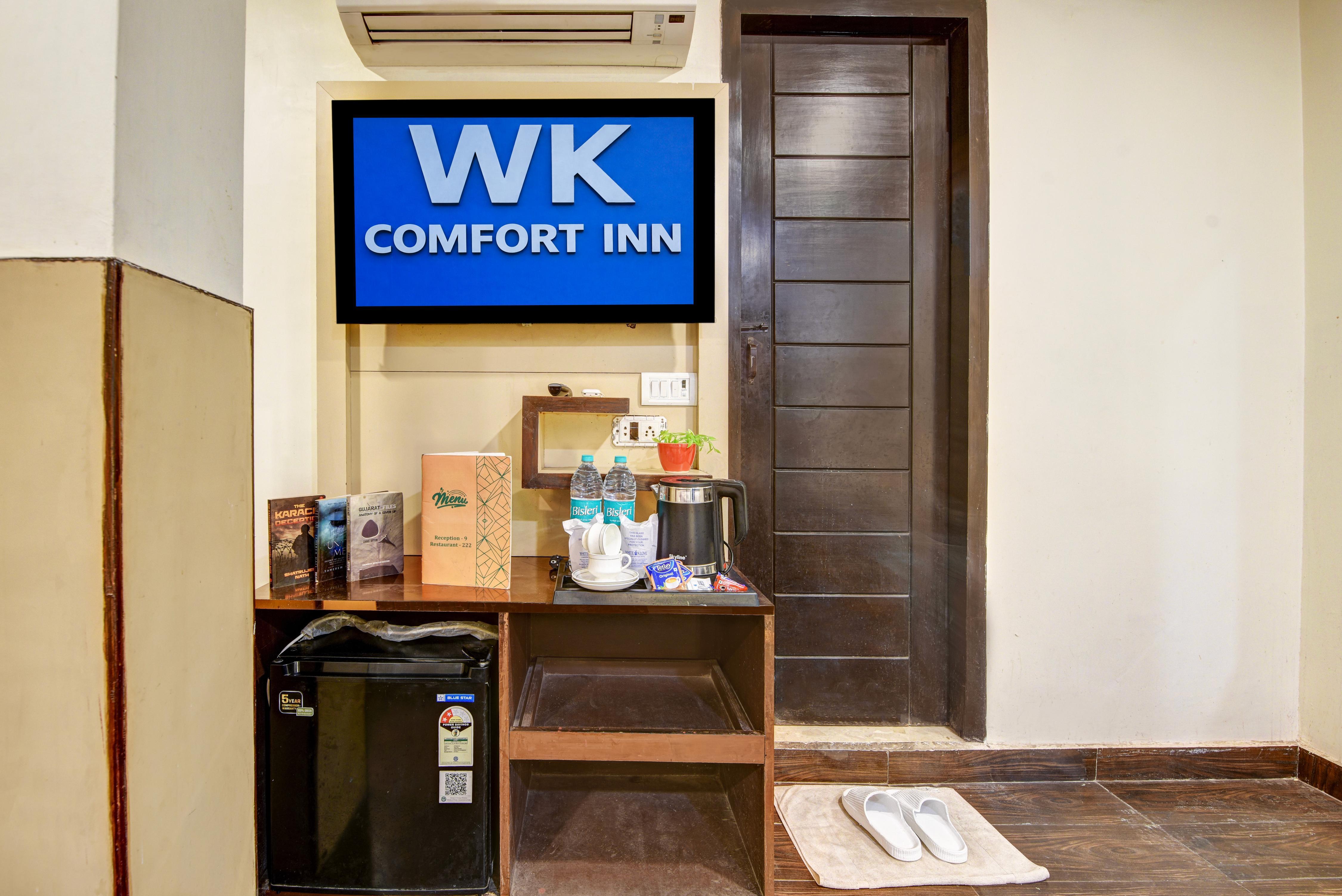 Hotel WK Comfort Inn with Rooftop - Near Connaught Place & Railway Station - Tap to explore photos