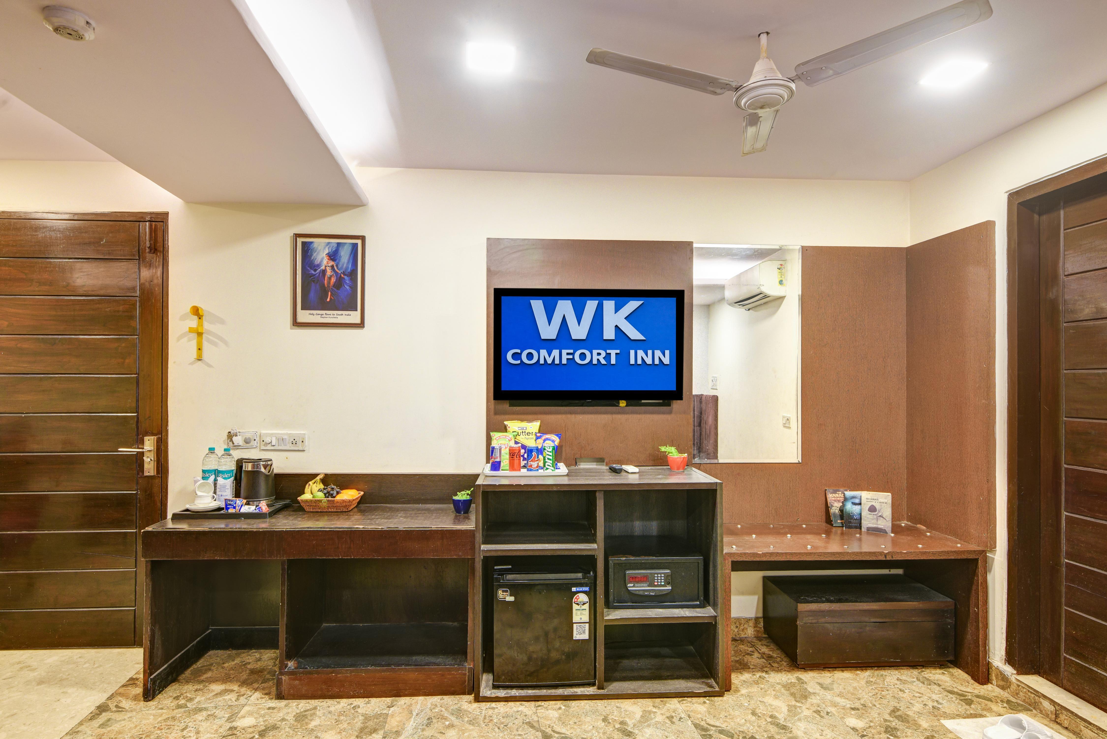 Hotel WK Comfort Inn with Rooftop - Near Connaught Place & Railway Station - Tap to explore photos