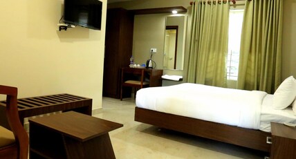 Kira Palace Residency Room Type - Deluxe Room AC