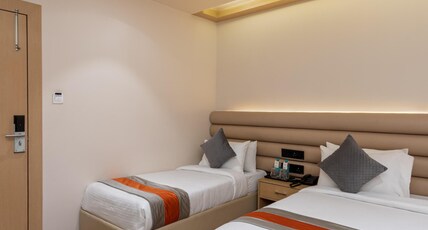Arihant Hotel and Restaurant Room Type - Family Suite ( 3 Bedded )