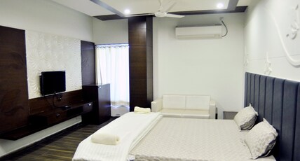HOTEL WAVES CLUB Room Type - Super Deluxe Room