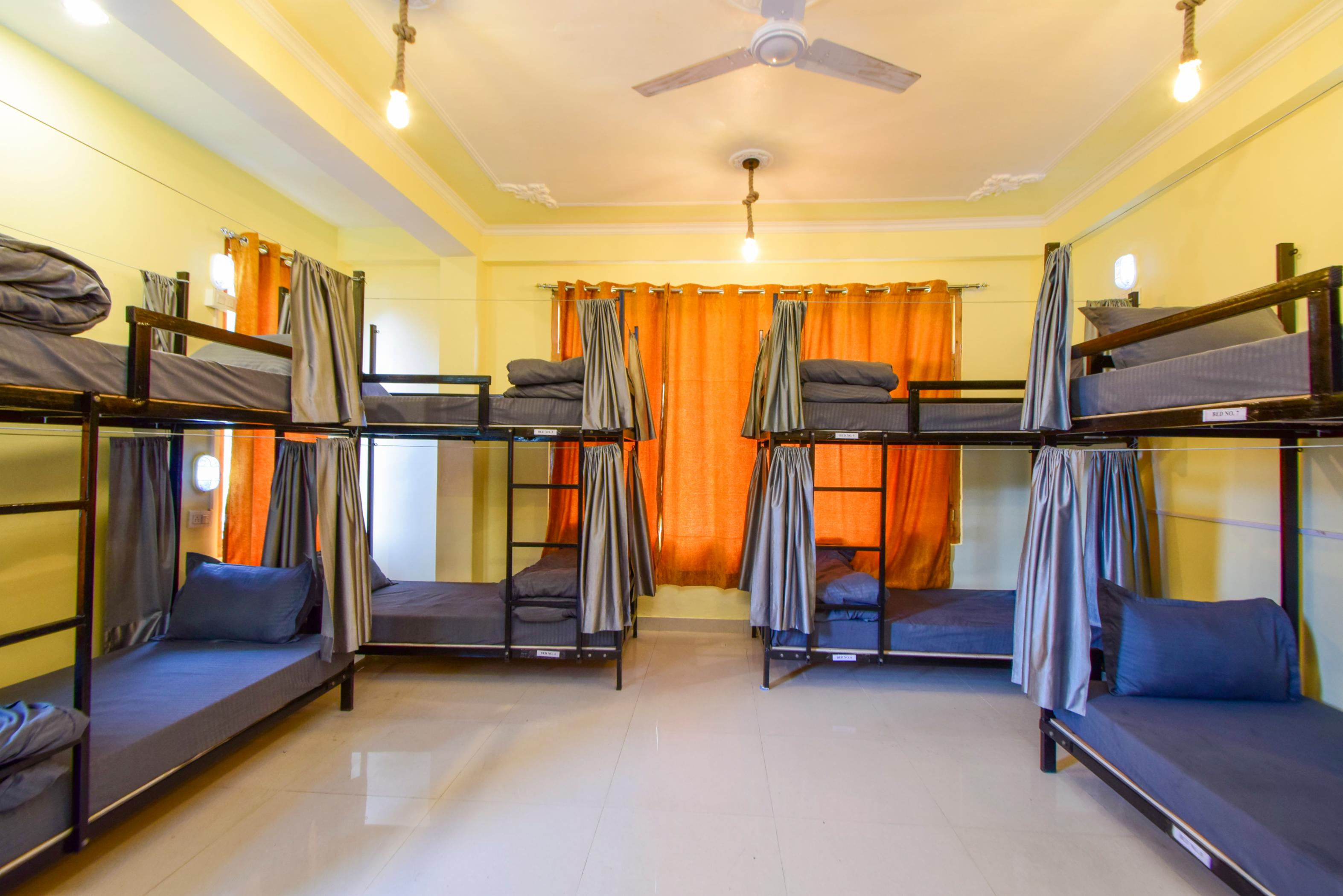 PerkUp Hostel | Private Rooms & Dorms Room Type - Bed in 8 Bed Dorm with Balcony and View