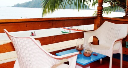 Cafe blue in Palolem Room Type - DELUXE AC SEA FRONT BEACH BANGALOWS