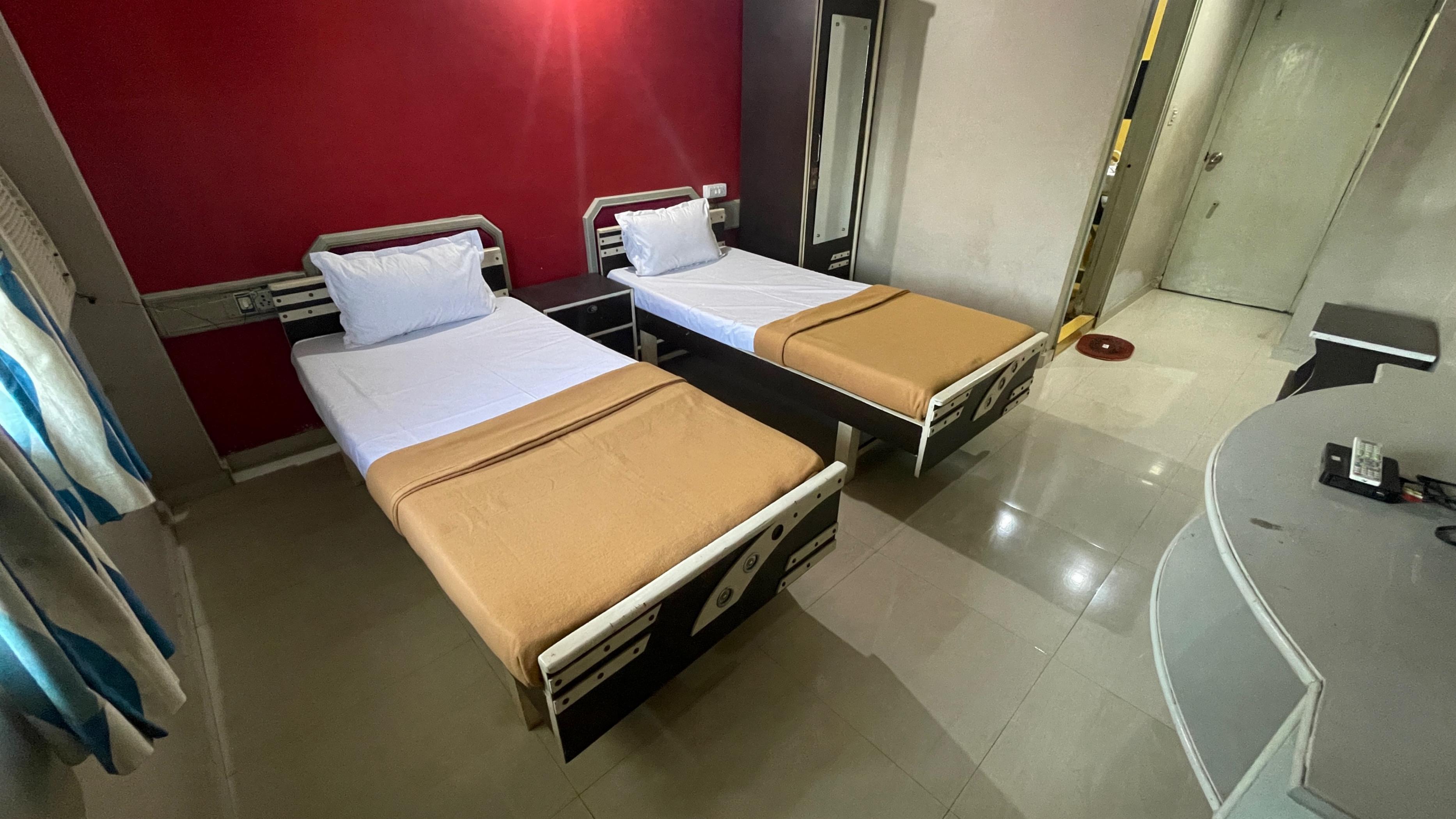 Hotel Parth - Tap to explore photos