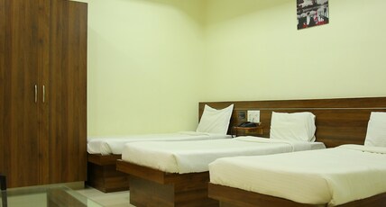 Maruthi inn Room Type - Deluxe Triple