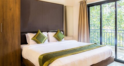 Treebo Aquamarine Arpora With Pool Room Type - Deluxe Room with Balcony