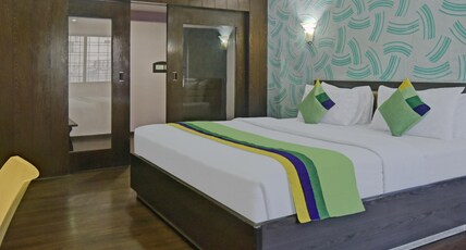 Treebo Savoury Sea Shell Residency Room Type - Deluxe Room