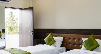 Treebo Malhaar Regency Room Type - Standard Room