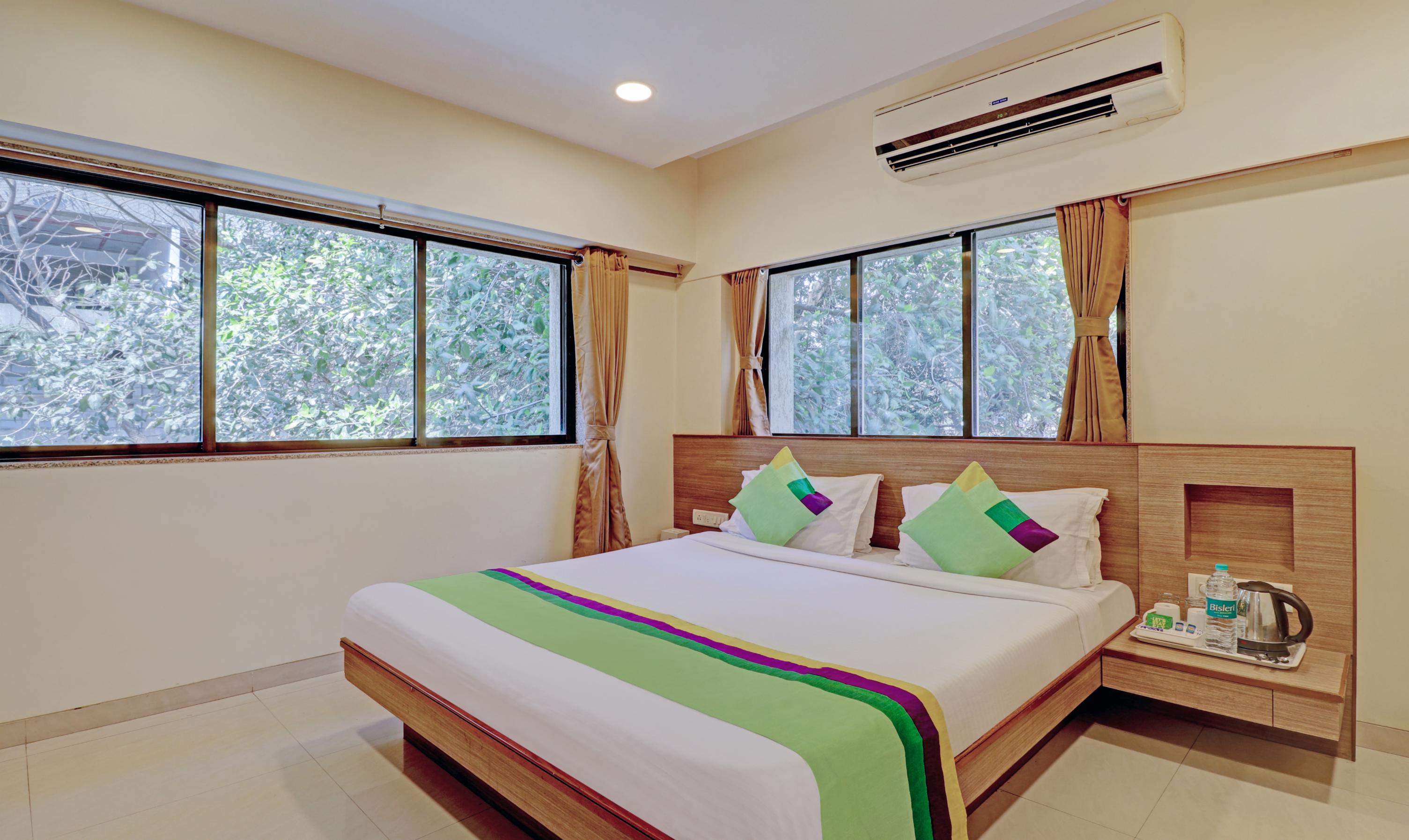 Treebo Vikrant Residency Room Type - Deluxe Family Room