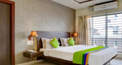Treebo Orchid, 2.5 Kms To Mahatma Gandhi Park Room Type - Deluxe Room