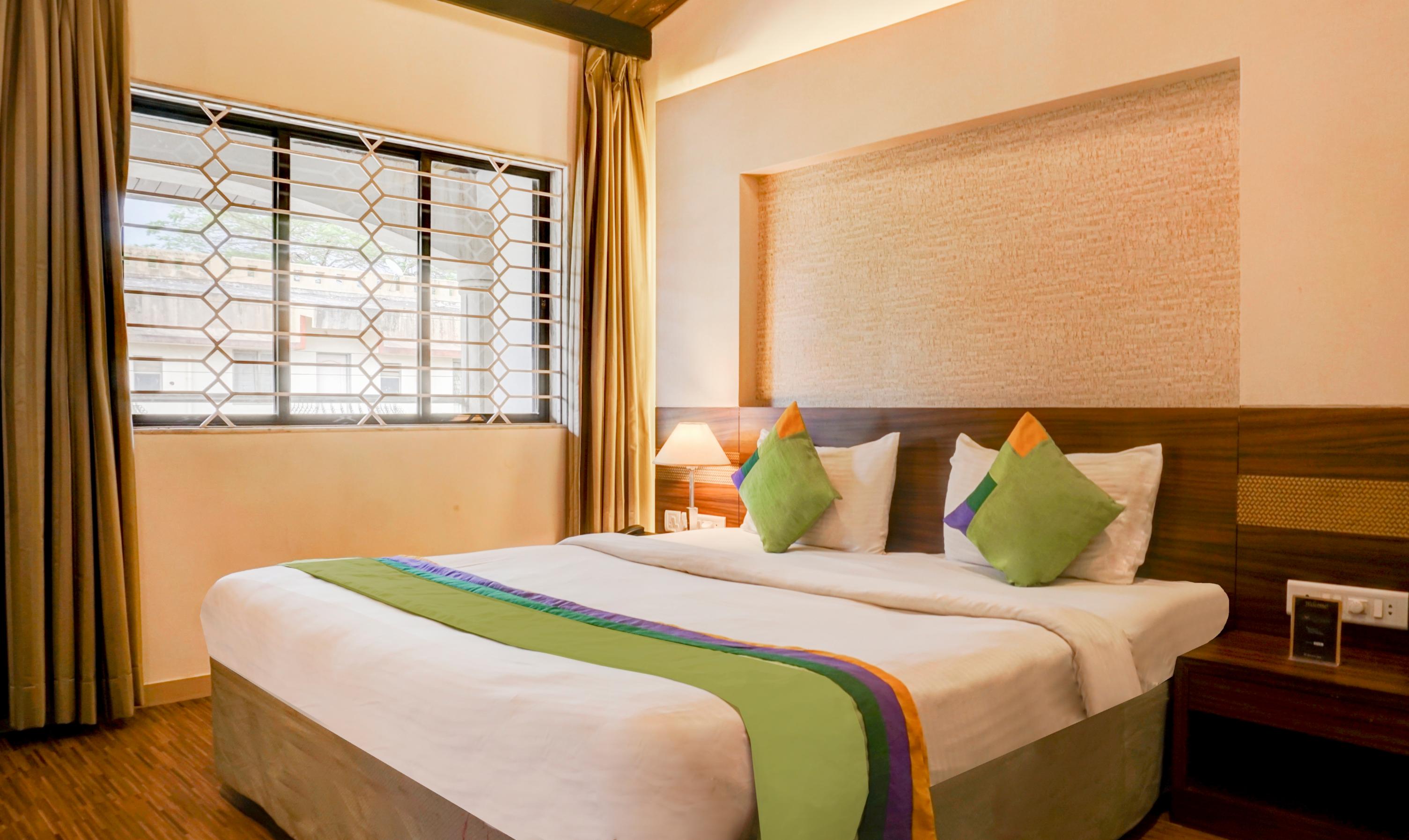 Treebo Five Elements With Swimming Pool Room Type - Premium Room with Balcony