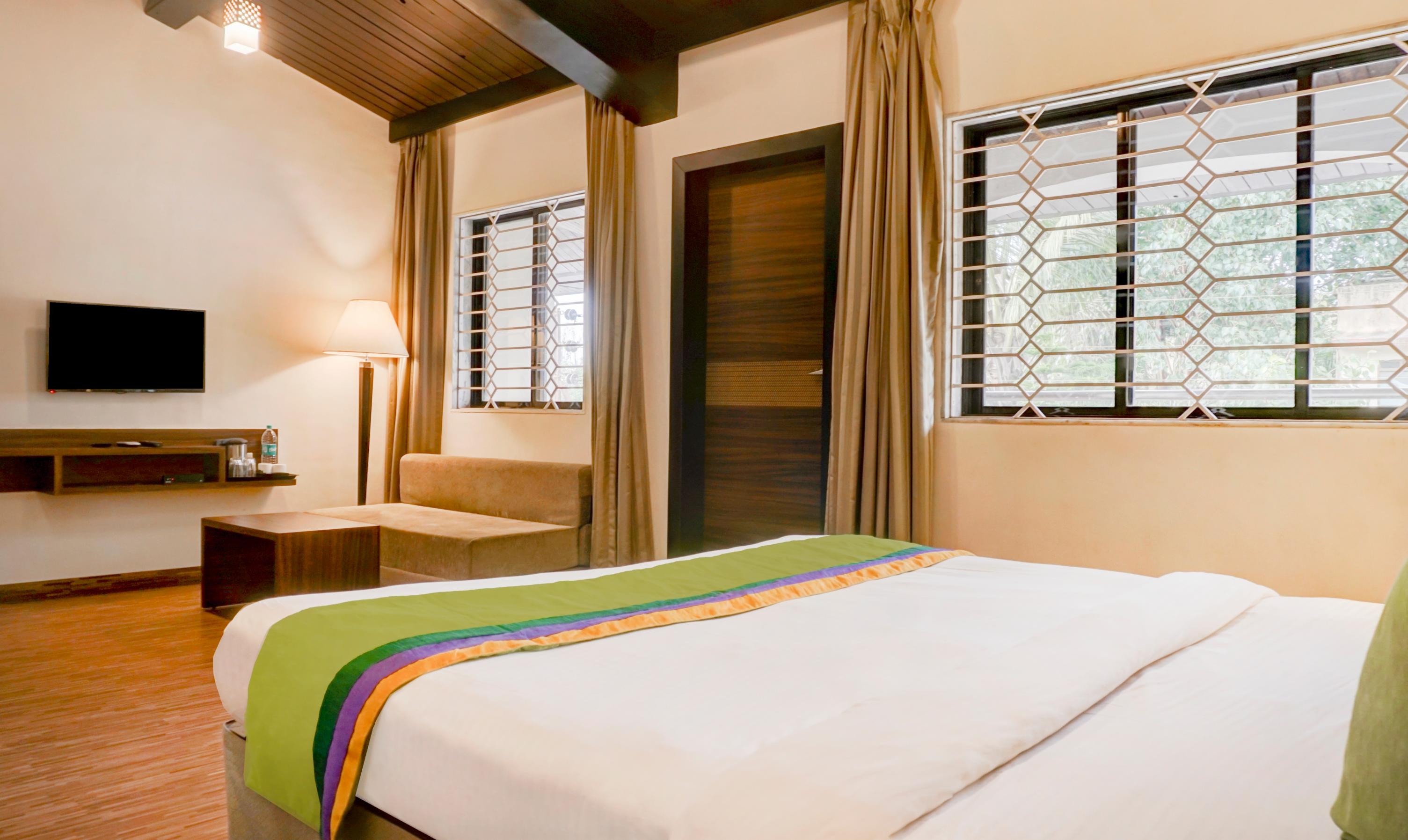 Treebo Five Elements With Swimming Pool - Tap to explore photos