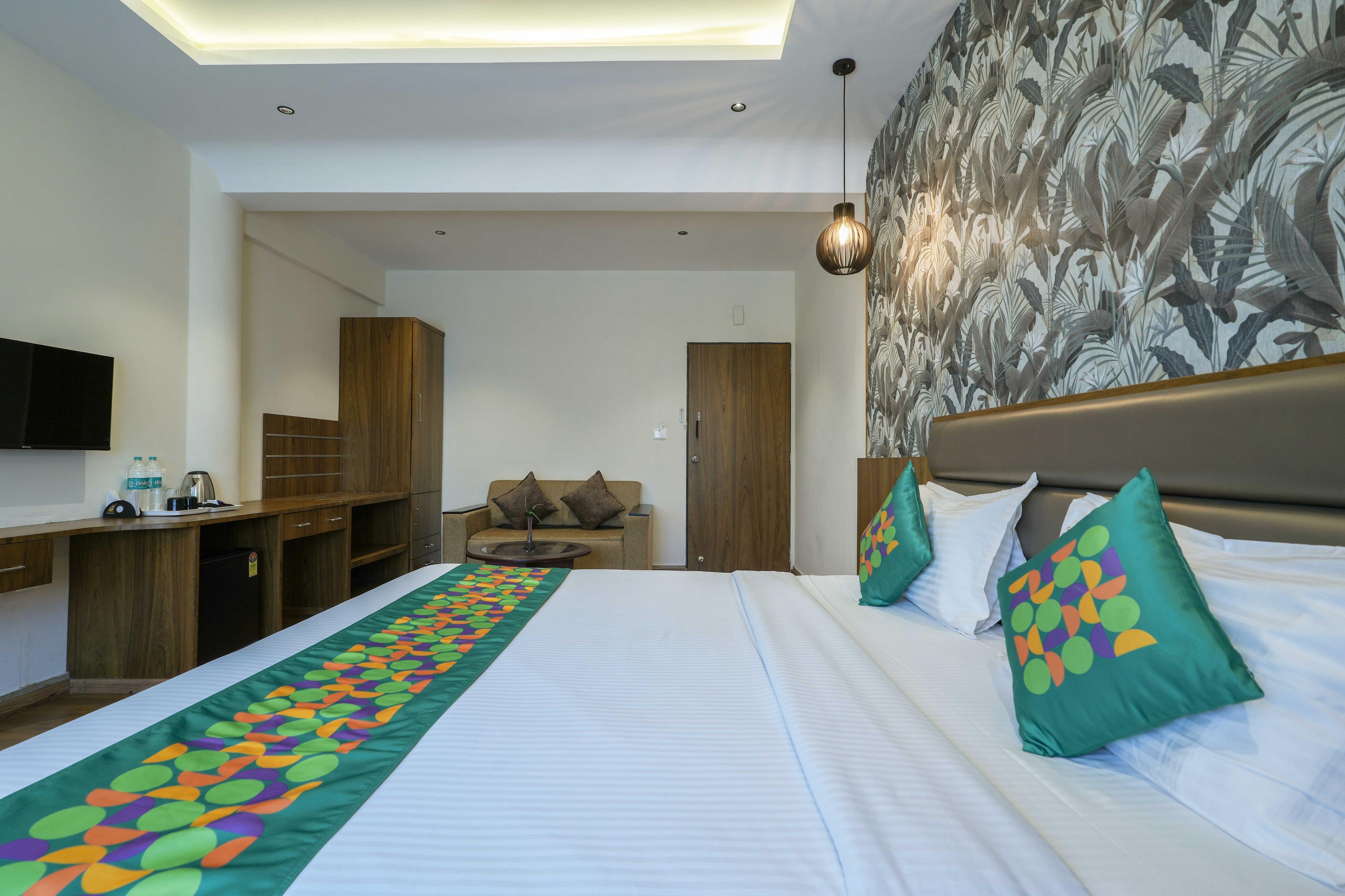 Treebo Pappilon Palace, PVS Circle - Tap to explore photos