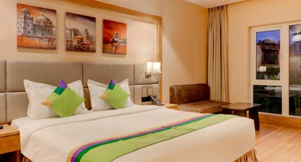 Treebo Radhe Palace, Lake Town Room Type - Premium Room
