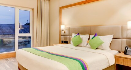 Treebo Radhe Palace, Lake Town Room Type - Deluxe Family Room