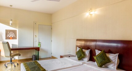 Treebo Brooks Manor Room Type - Deluxe Room