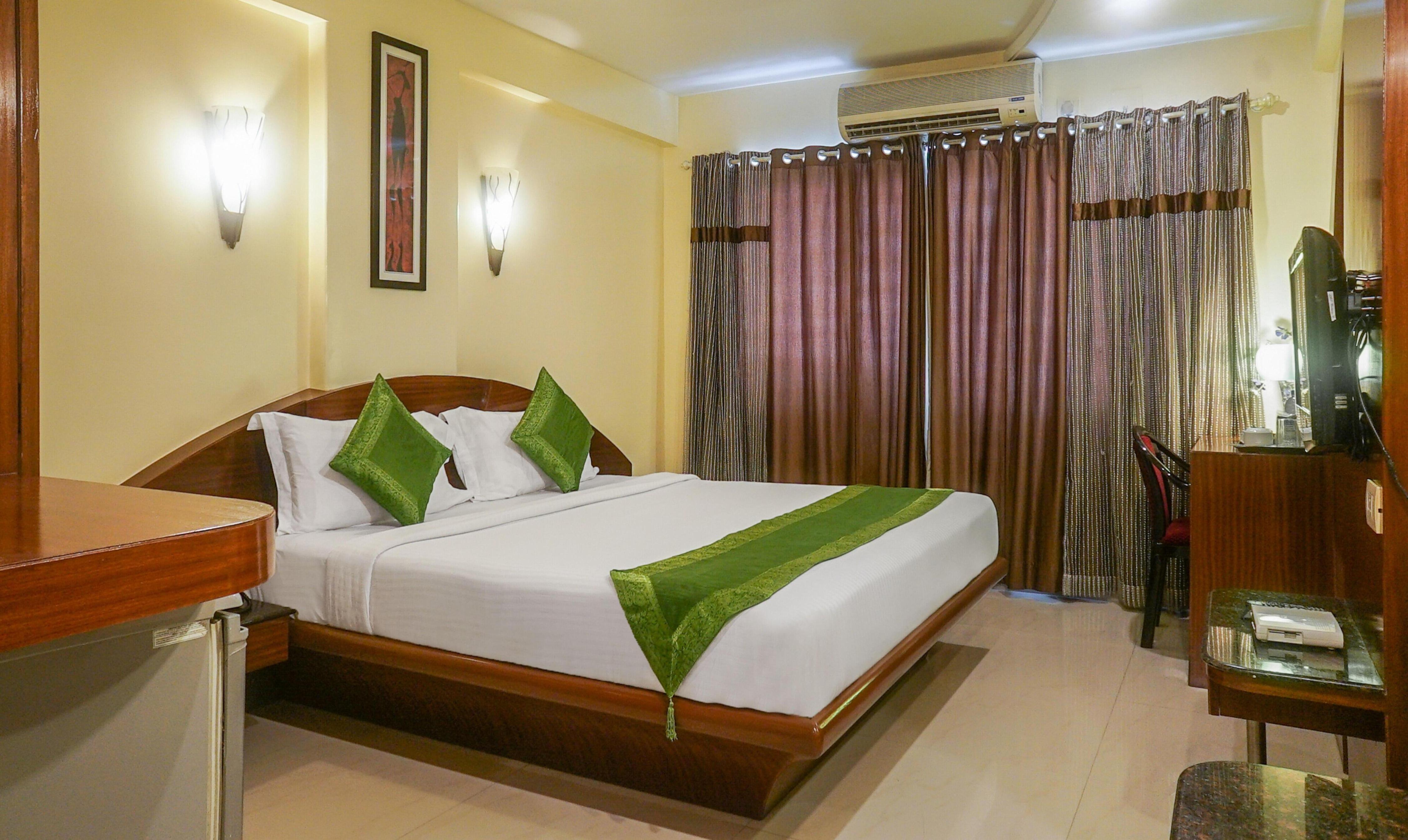 Treebo Brahma Regency - Tap to explore photos